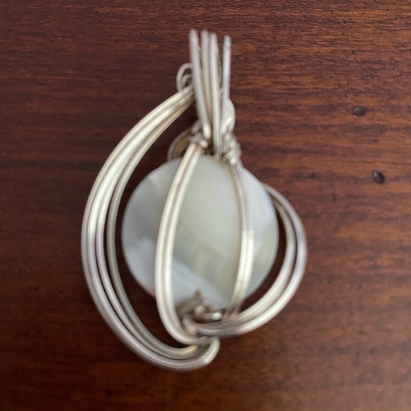 Handmade Mother of Pearl Pendant with Twisted Silver Wire Wrap Design - Picture 4 of 5